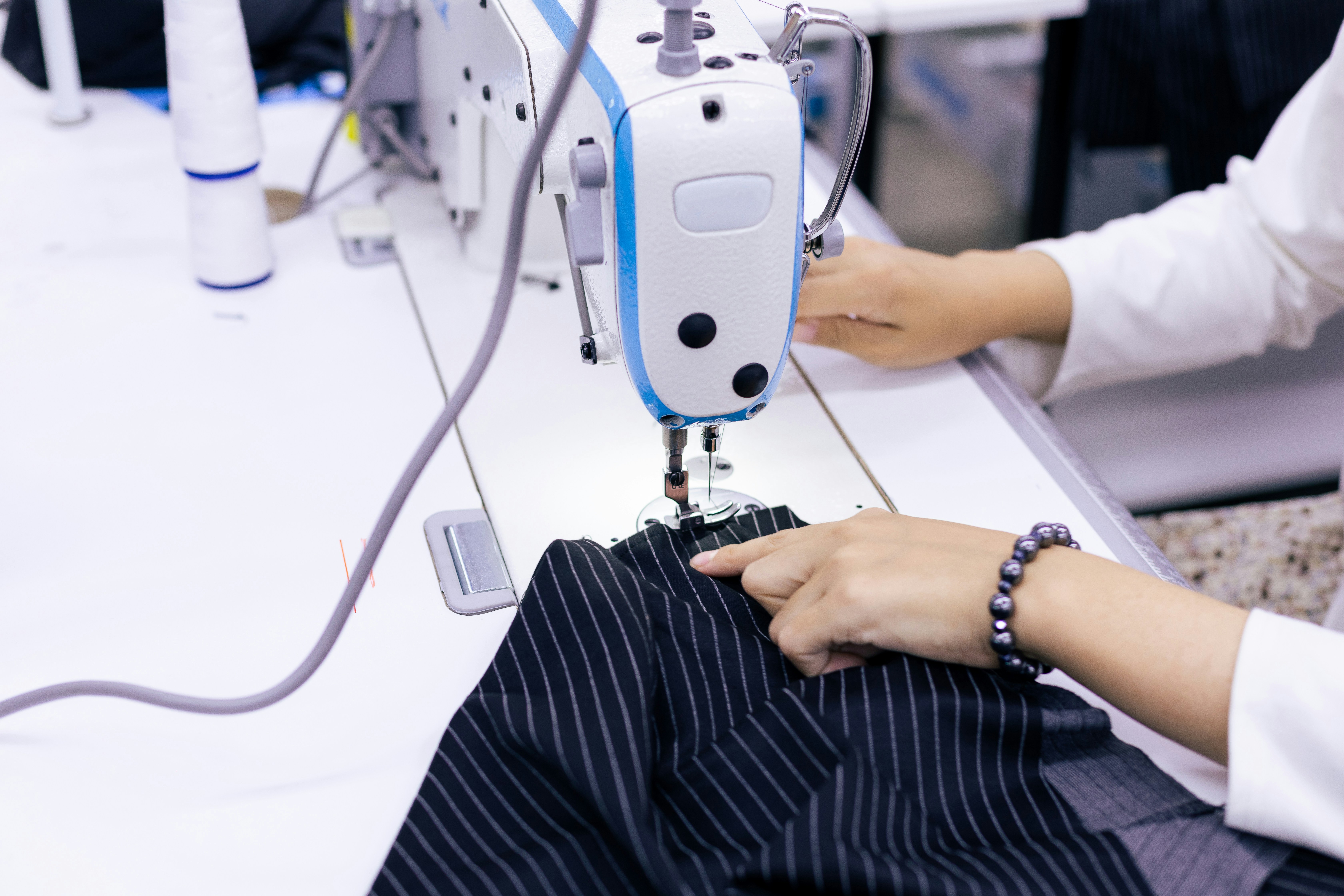 A garment being stitched on the production line